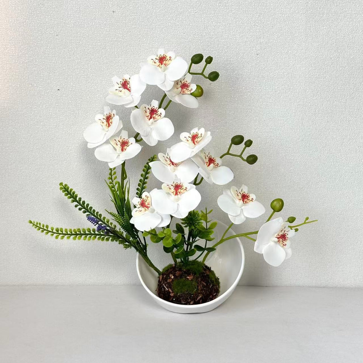 Faux-Orchidee Blumenarrangement für die Wohnungsdekoration