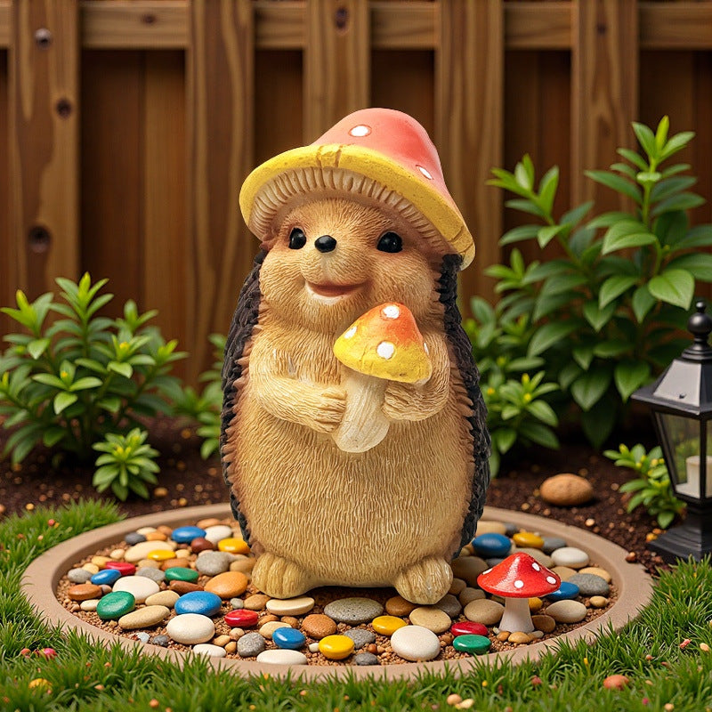 Niedliche Igel Skulptur mit Obst Brehn