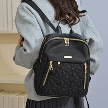 Elegante gesteppte Multi-Taschen-Rucksack Brehn