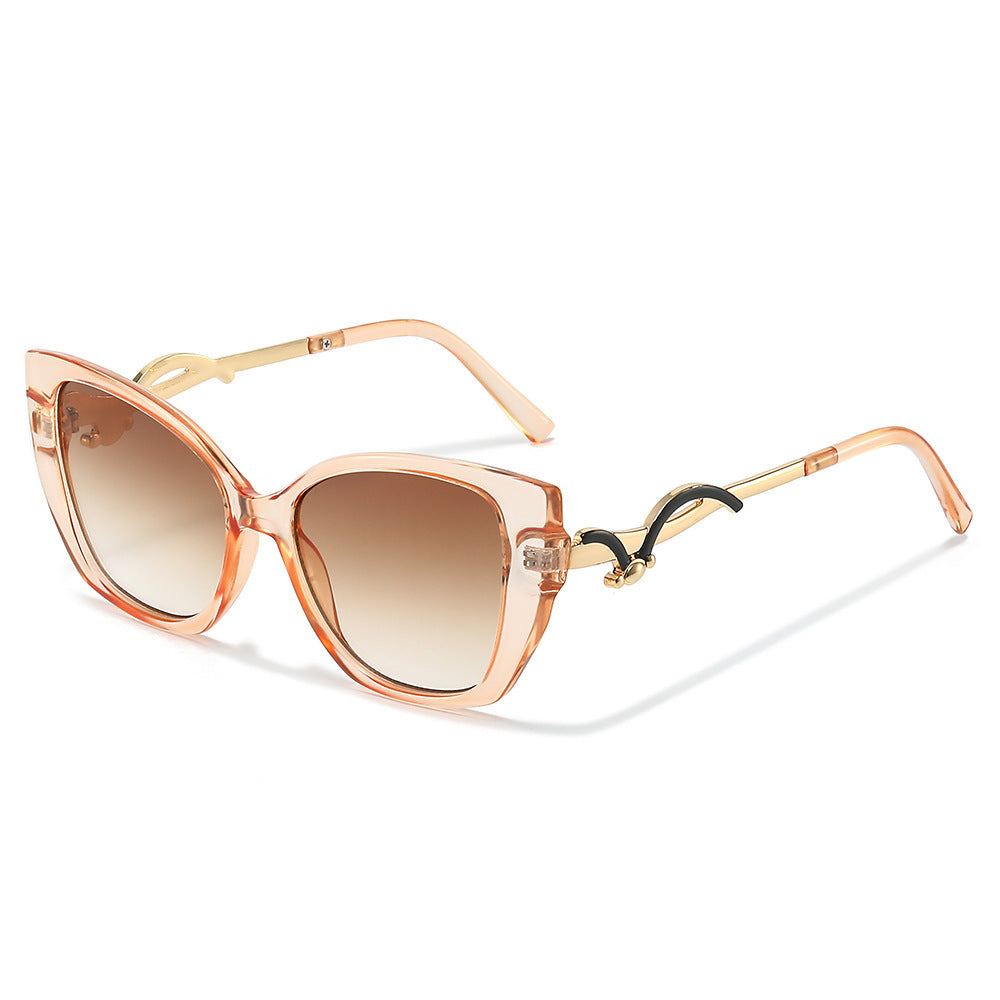 Übergroße Geometrische Katzenaugen-Sonnenbrille mit goldenen Akzenten Brehn