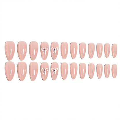Kunstnagelset mit eleganten Schleifenakzenten Brehn
