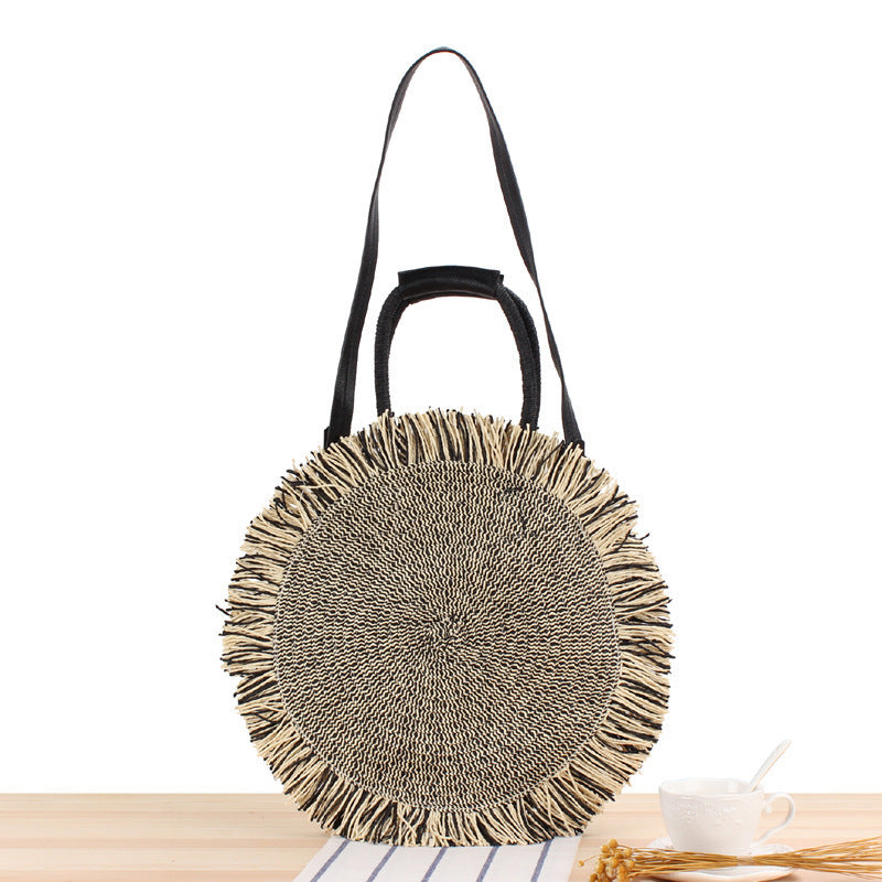 Rundtasche mit Fransenverzierung Aus Geflochtenem Material Brehn
