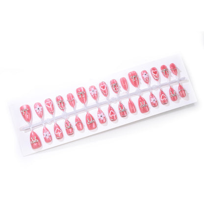 Dekoratives Press-On Nagelkunstset mit einzigartigen Herz- und Blumendesigns Brehn