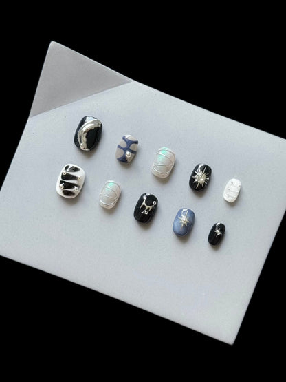Künstlerisches Press-On Nagelset mit kosmischen Themen
