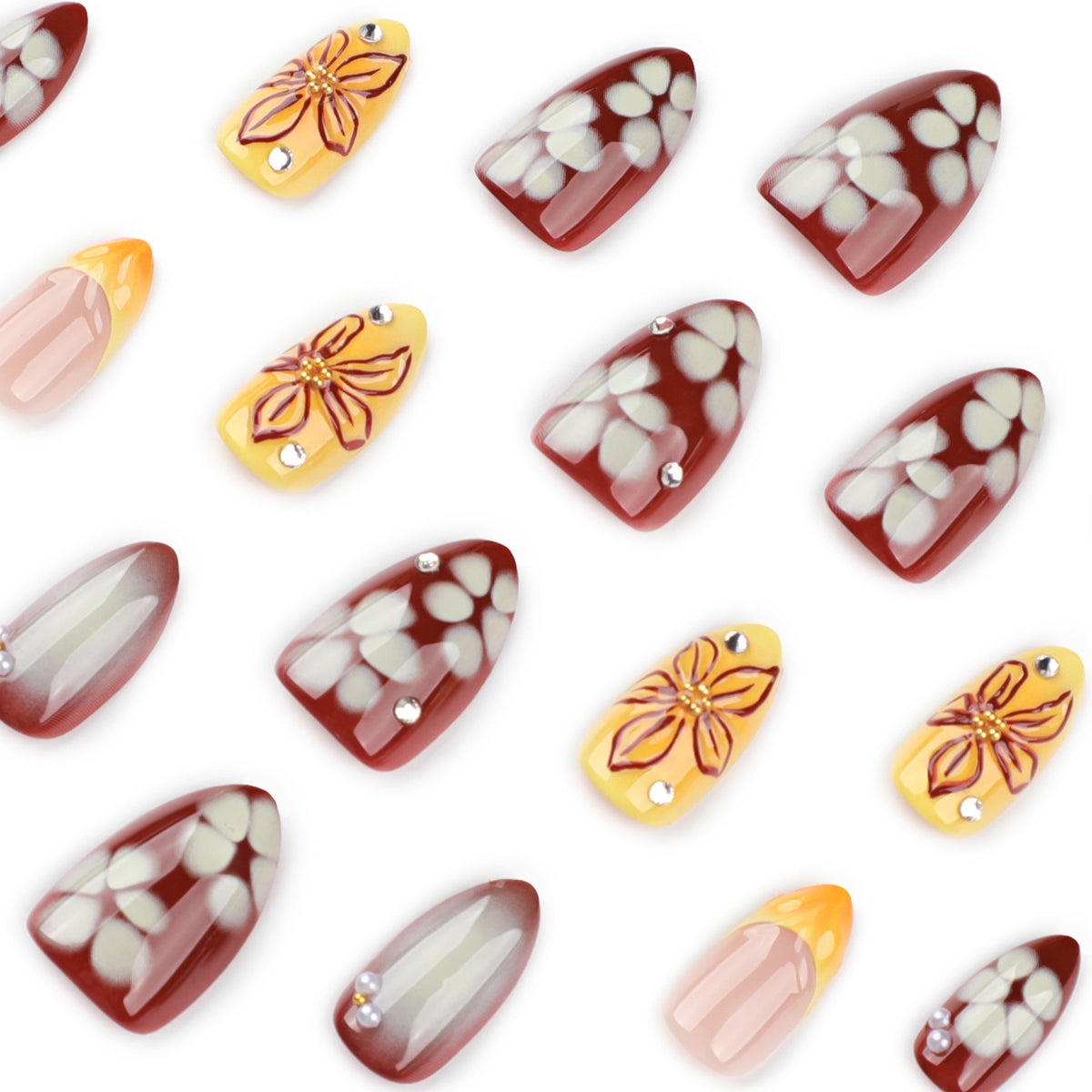 Künstliche Nagelverlängerungen mit floralem Design und Strassverzierungen Brehn