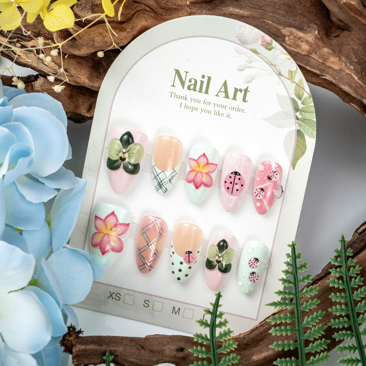 Kreatives blumenmotiviertes Press-On-Nagelset
