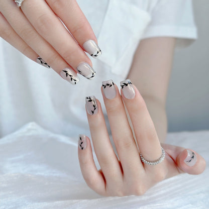 Künstlerisches Press-On Nagelset mit botanischen Designs