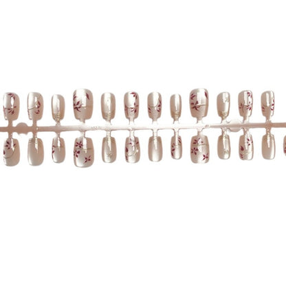 Künstlerisches Floral Press-On Nails Set Brehn