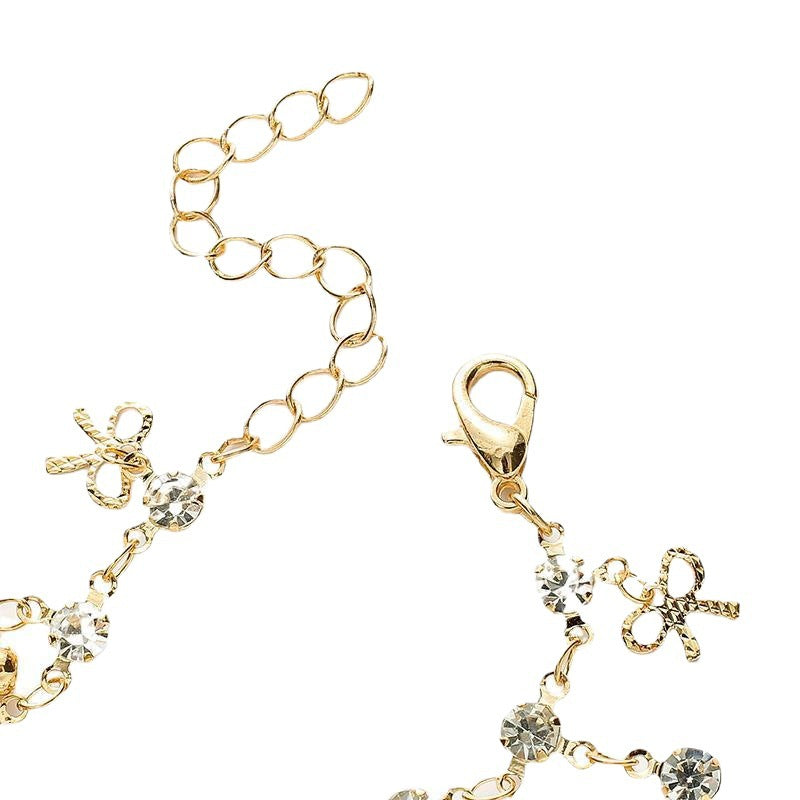 Crystal Bow Charm Bracelet Brehn