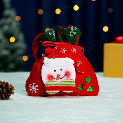 Niedlicher Weihnachtsgnom mit Geschenkesack Brehn