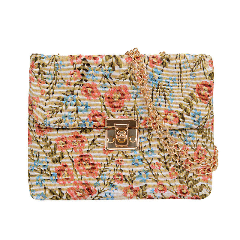 Blumengemusterte Abendtasche