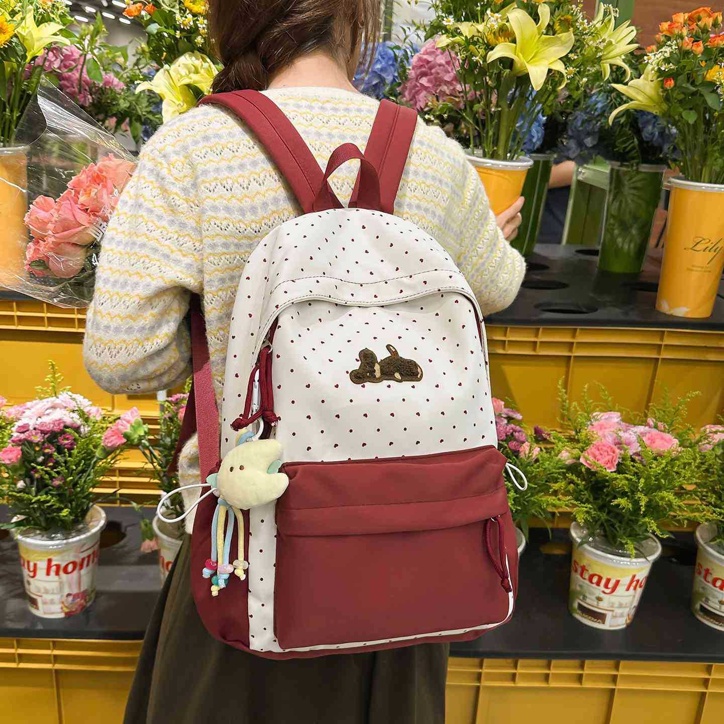 Verspielter gepunkteter animierter Rucksack Brehn