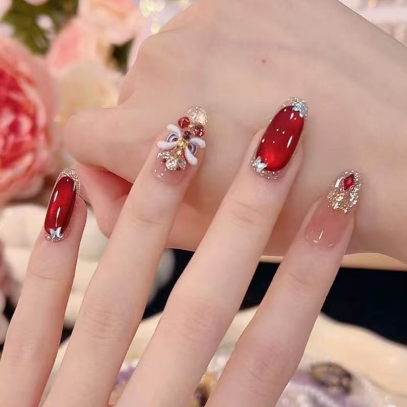 Künstlerische mit Strass veredelte Nagelverlängerungen Brehn