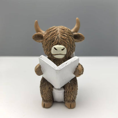 Lustige Dekofigur eines Highlandrinds in Badewanne Brehn