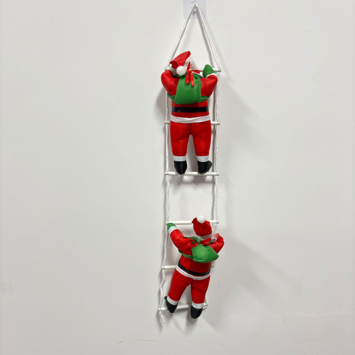 Dekorative Weihnachtsmann Figuren mit Leiter