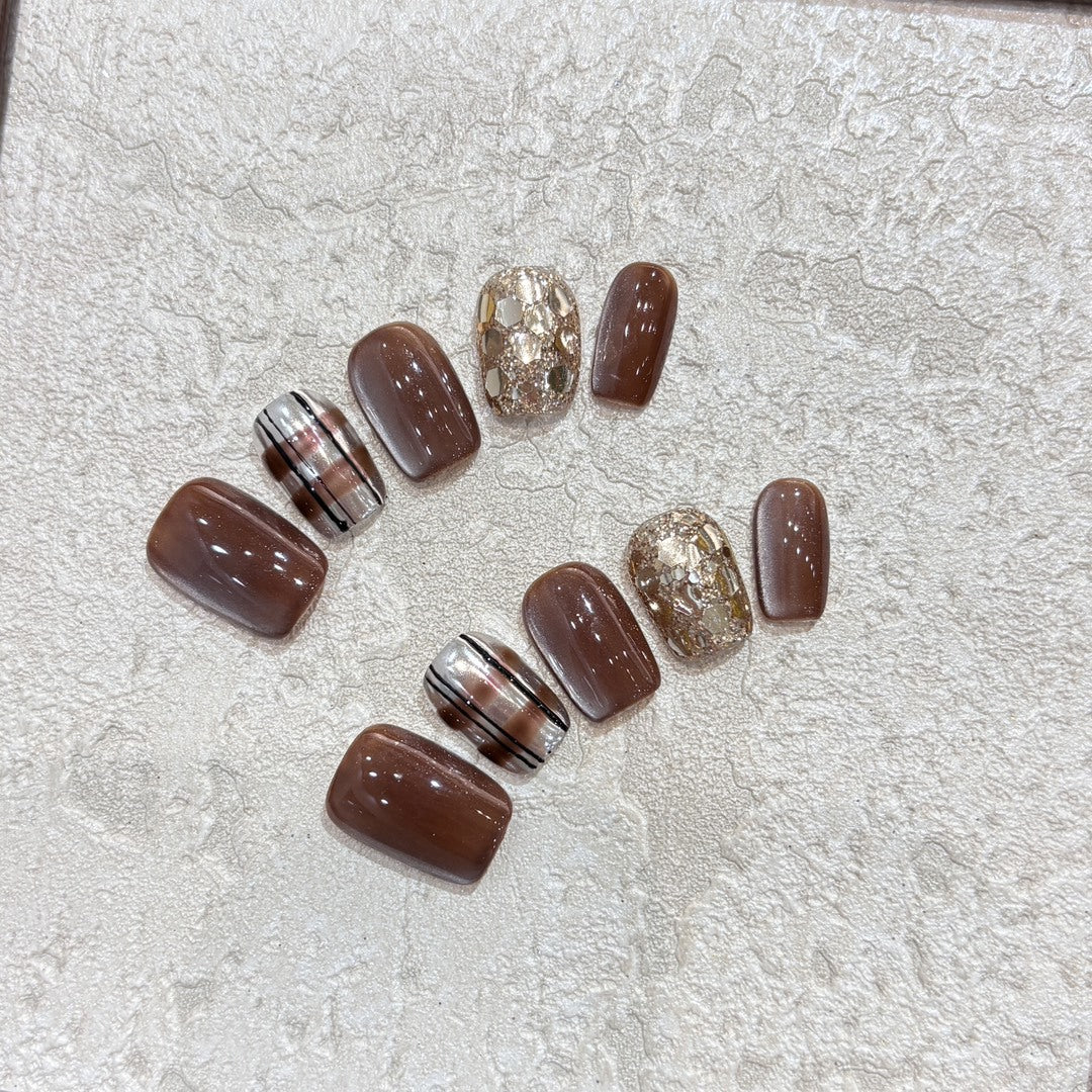 Kunstnägel-Set mit Glitzer- und Goldakzenten Brehn