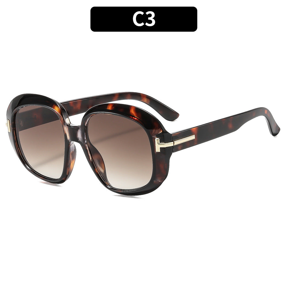 Überdimensionale Katzenaugen-Sonnenbrille mit schlichten dekorativen Akzenten