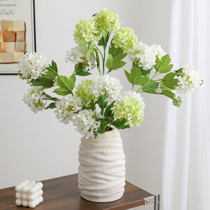 Künstlicher Hydrangeazweig mit lebhaften Blüten und detailreichen Blättern Brehn