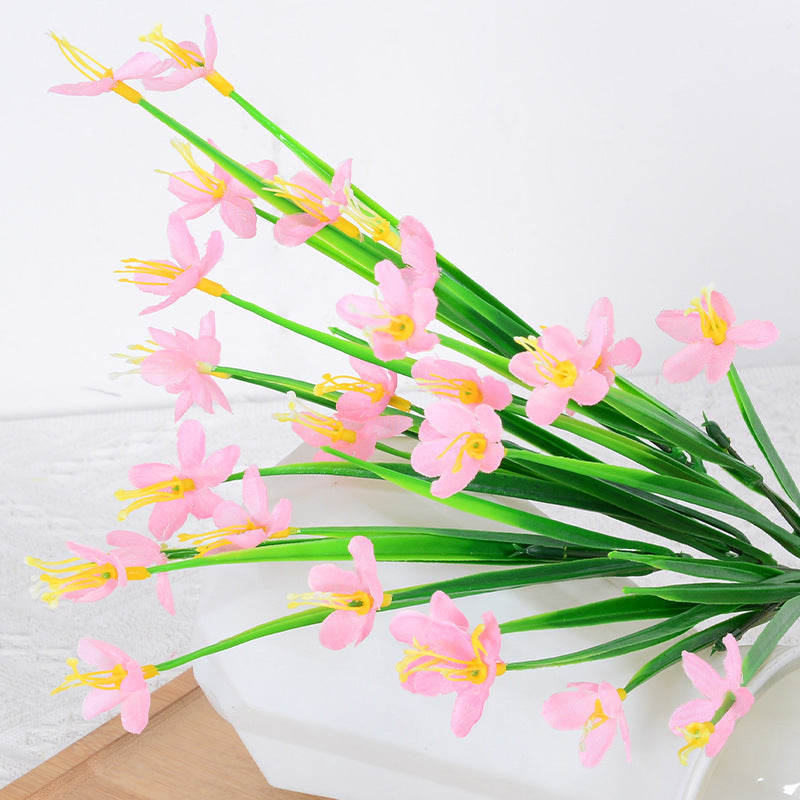 Künstliches Orchideenstammarrangement