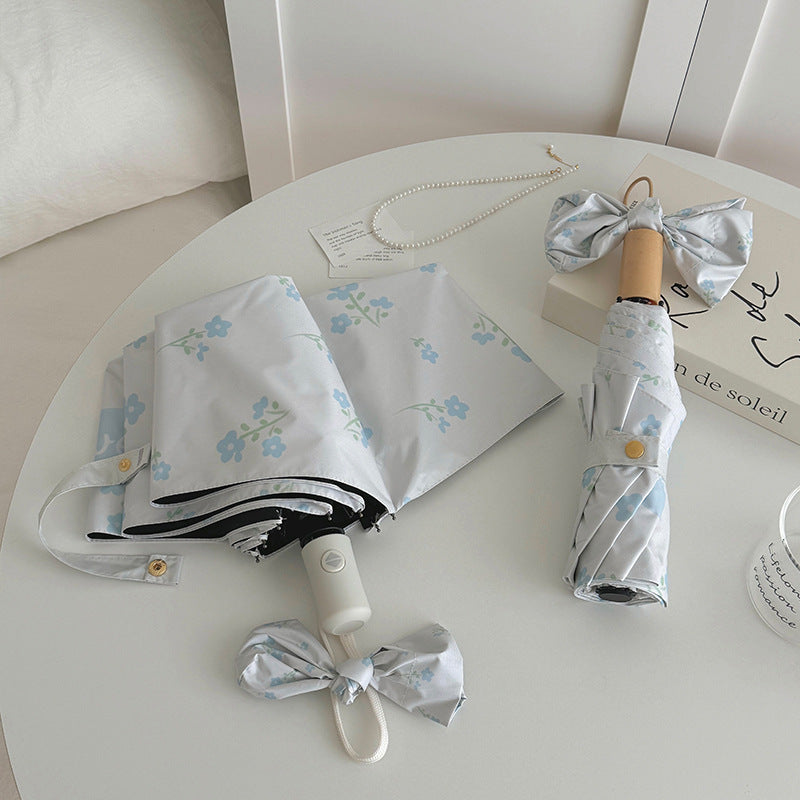 Damen Faltender Regenschirm mit stilvollem Blumendesign Brehn