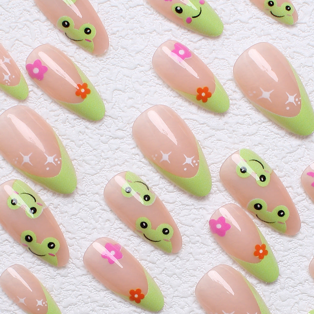 Kunstnagelset mit kreativen Froschmotiven und verspielten Akzenten Brehn