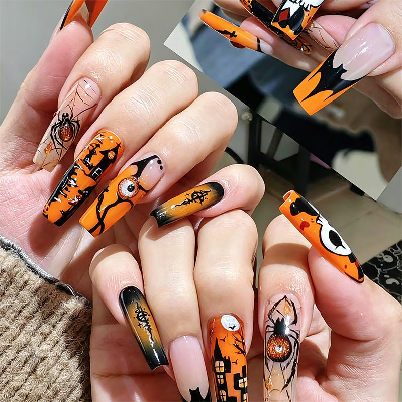 Kunstnagelset mit Halloween-Motiven und kreativem Glitzer Brehn
