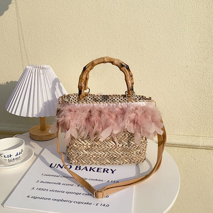 Elegante Handtasche mit Federn und Bambusgriffen Brehn