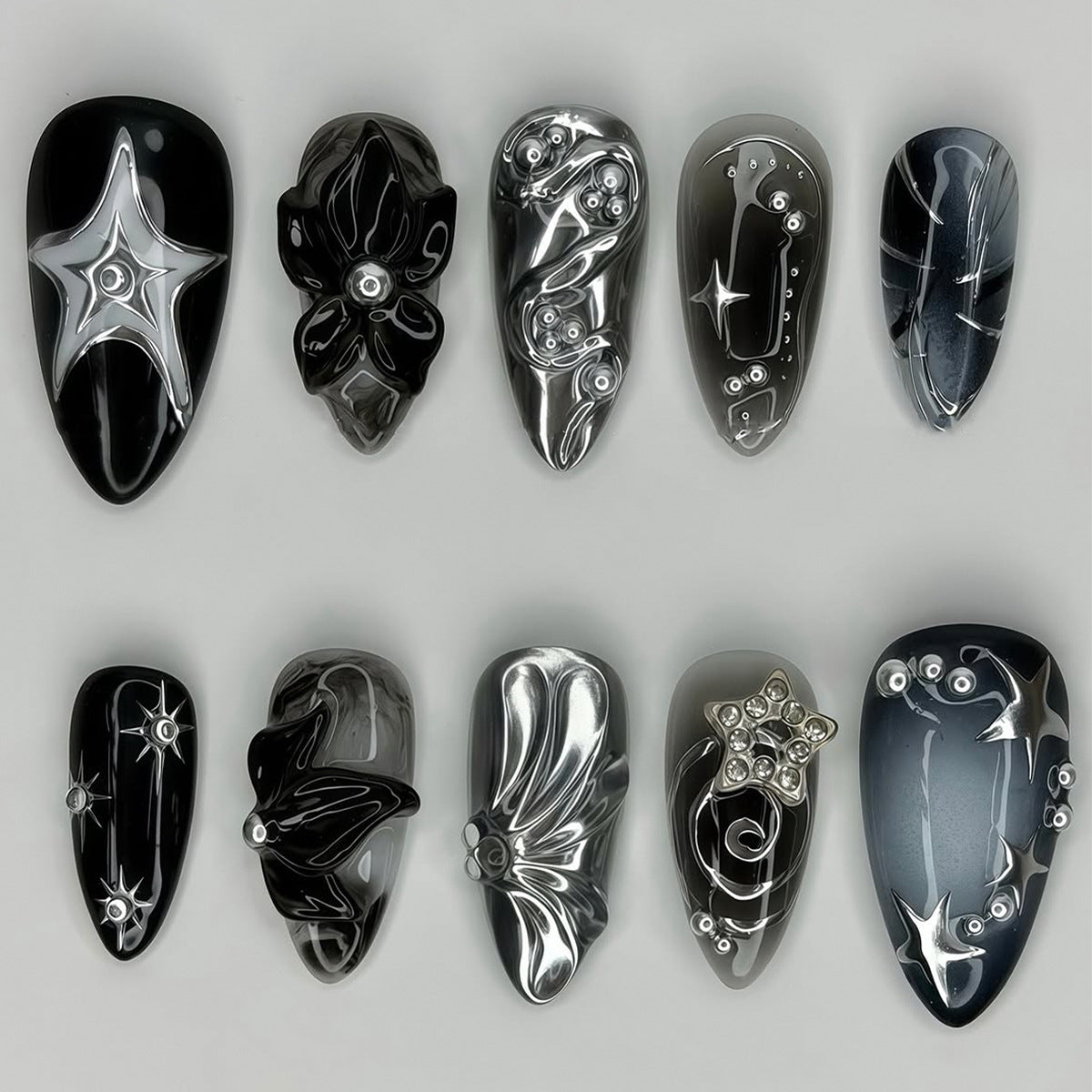 Künstlerisches schwarzes Nagelspitzen-Set Brehn