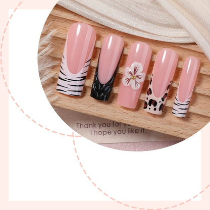 Kunstnagelset mit floralen und marmorierten Designs Brehn