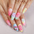 Kreatives Kunstnagelset mit verspieltem floralen Design und Glitzereffekten Brehn