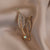 Elegante Brosche mit Blattform und Kristallen Brehn