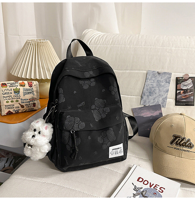 Niedlicher gemusterter Canvas-Schulrucksack