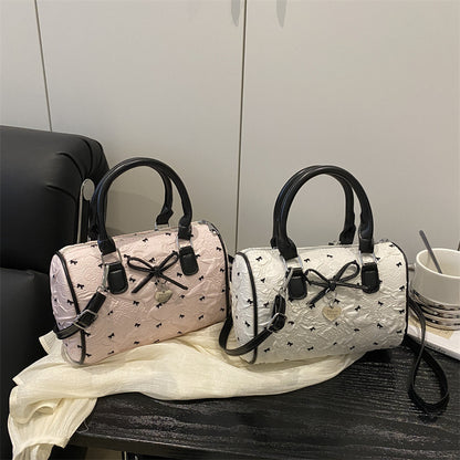 Bogen-verzierte Handtasche