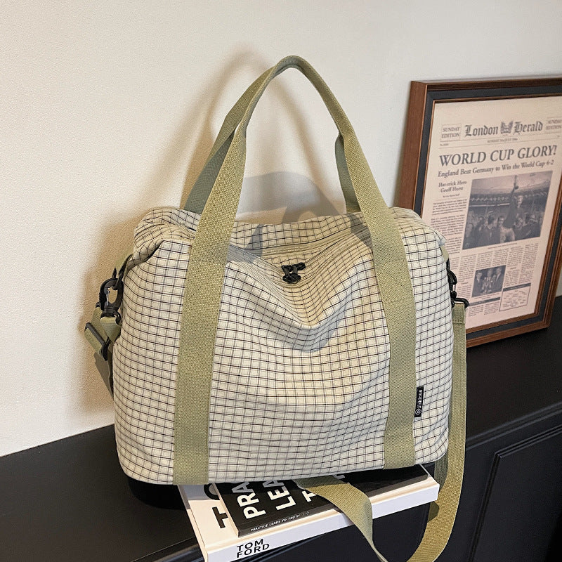 Gestreifter Reise-Duﬄe