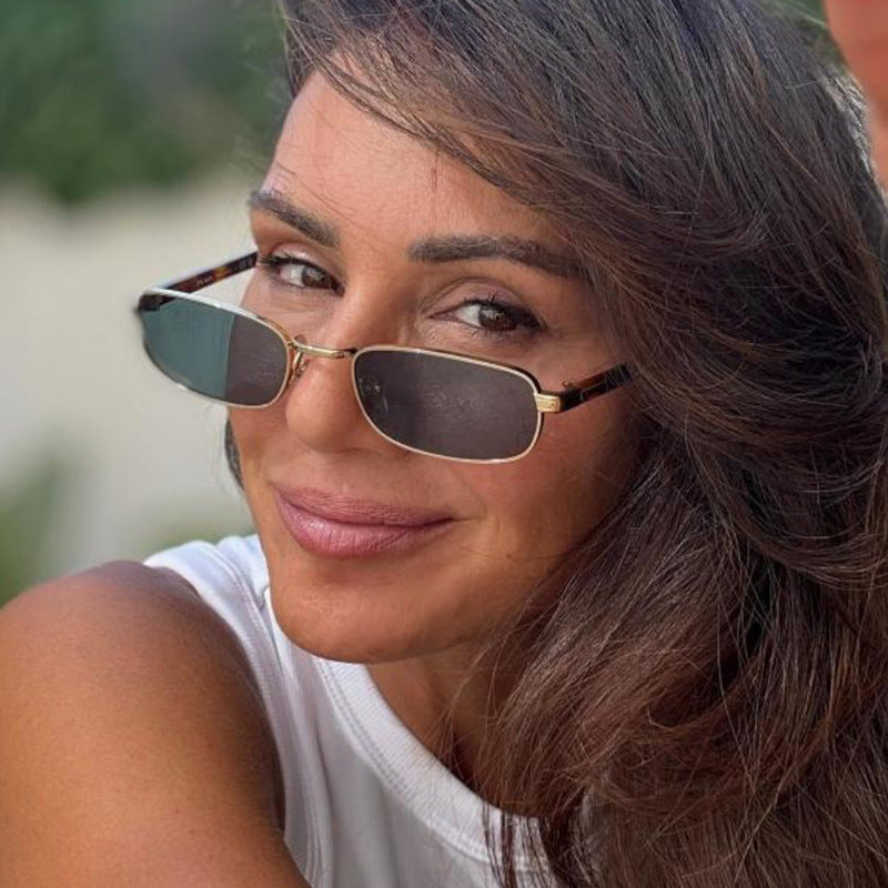 Damen modische Sonnenbrille mit stilvollem Metallrahmen und orangefarbenen Gläsern Brehn