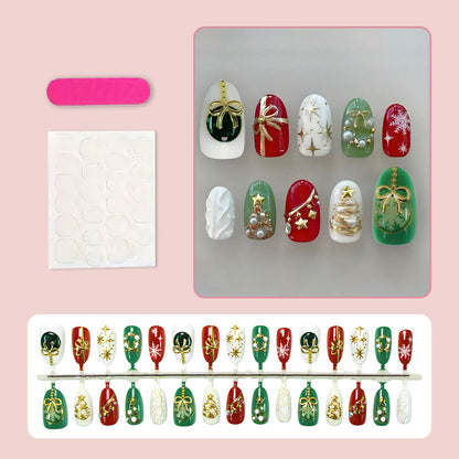 Kunstnagelset mit festlichen Weihnachtsmotiven und glamourösen Goldverzierungen Brehn