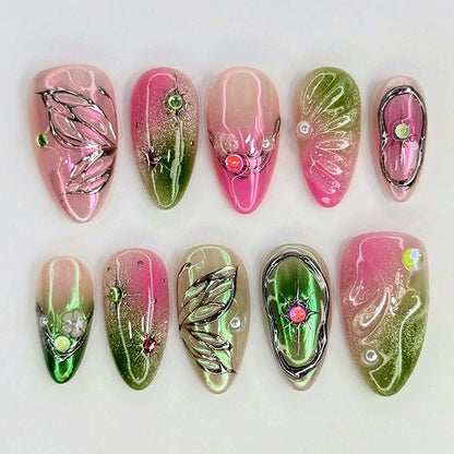 Kunstnagelset mit eleganten Farbverläufen und dekorativen 3D-Elementen Brehn