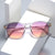 Damen elegante Sonnenbrille mit transparentem Rahmen und stylischen Akzenten Brehn