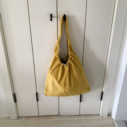 Legere Kordelzug Schultertasche