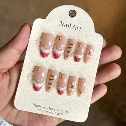 Elegantes floral und Goldakzent Press-On Nagelset Brehn