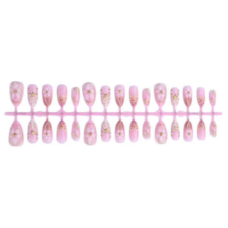 Elegantes, mit Blumen verziertes Press-On-Nagelset Brehn