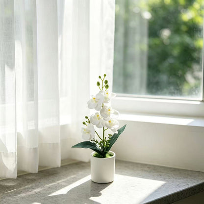 Elegante künstliche Orchideenpflanzenanordnung für die Innenausstellung