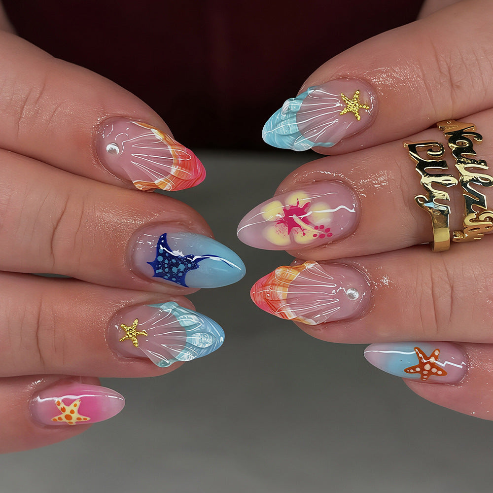 Künstlerische vom Ozean inspirierte Press-On Nagelkunst Brehn