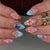 Künstlerische vom Ozean inspirierte Press-On Nagelkunst Brehn