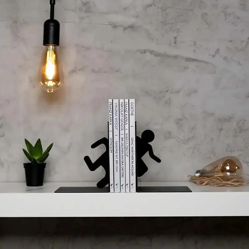 Verspielte figurative Buchstützen