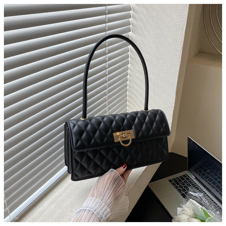 Elegante gestepptes Handtasche