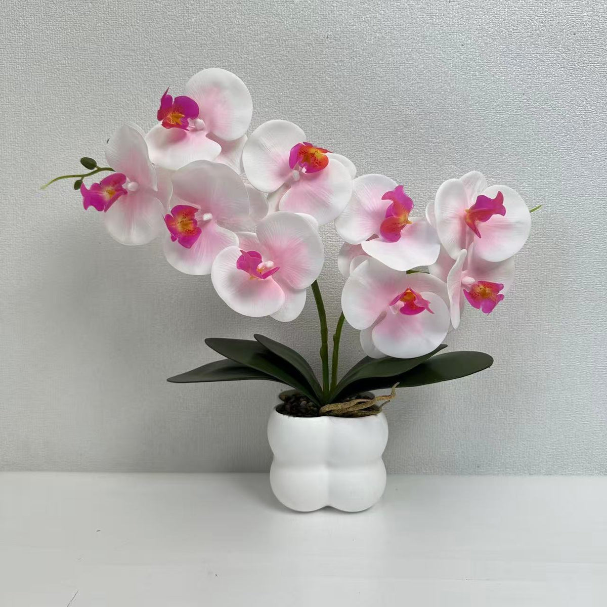 Künstliches Orchideenarrangement für die Wohnkultur und die Innenausstellung