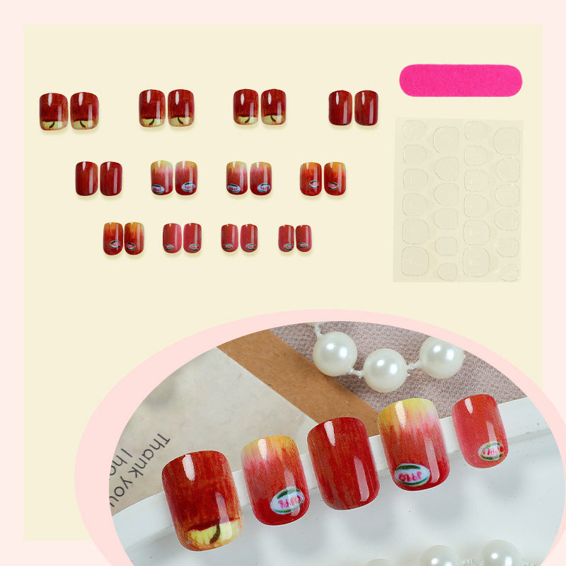 Künstlerisches Press-on-Nail-Set mit einzigartigen Apfel-Designs Brehn