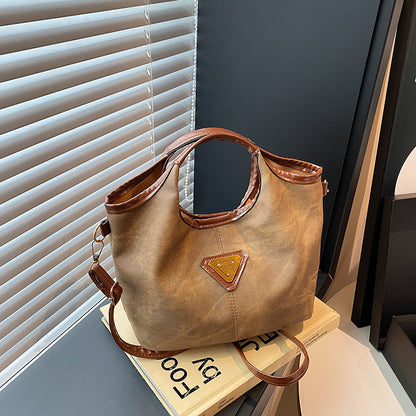 Glänzende Kunstleder-Handtasche