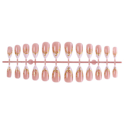 Kunstnagelset mit edlen Goldakzenten und transparentem Design Brehn